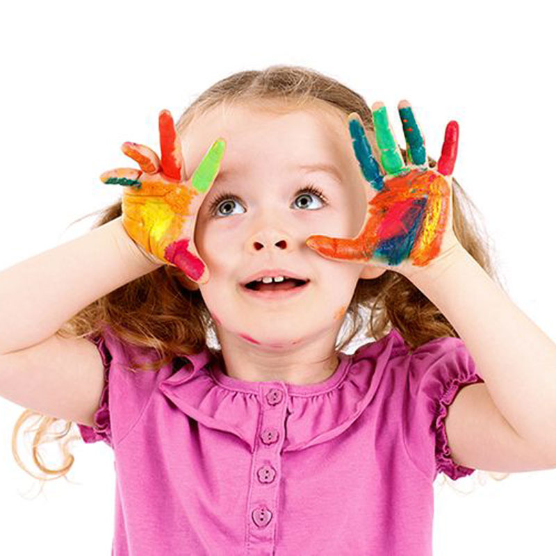 kid with paint on hands